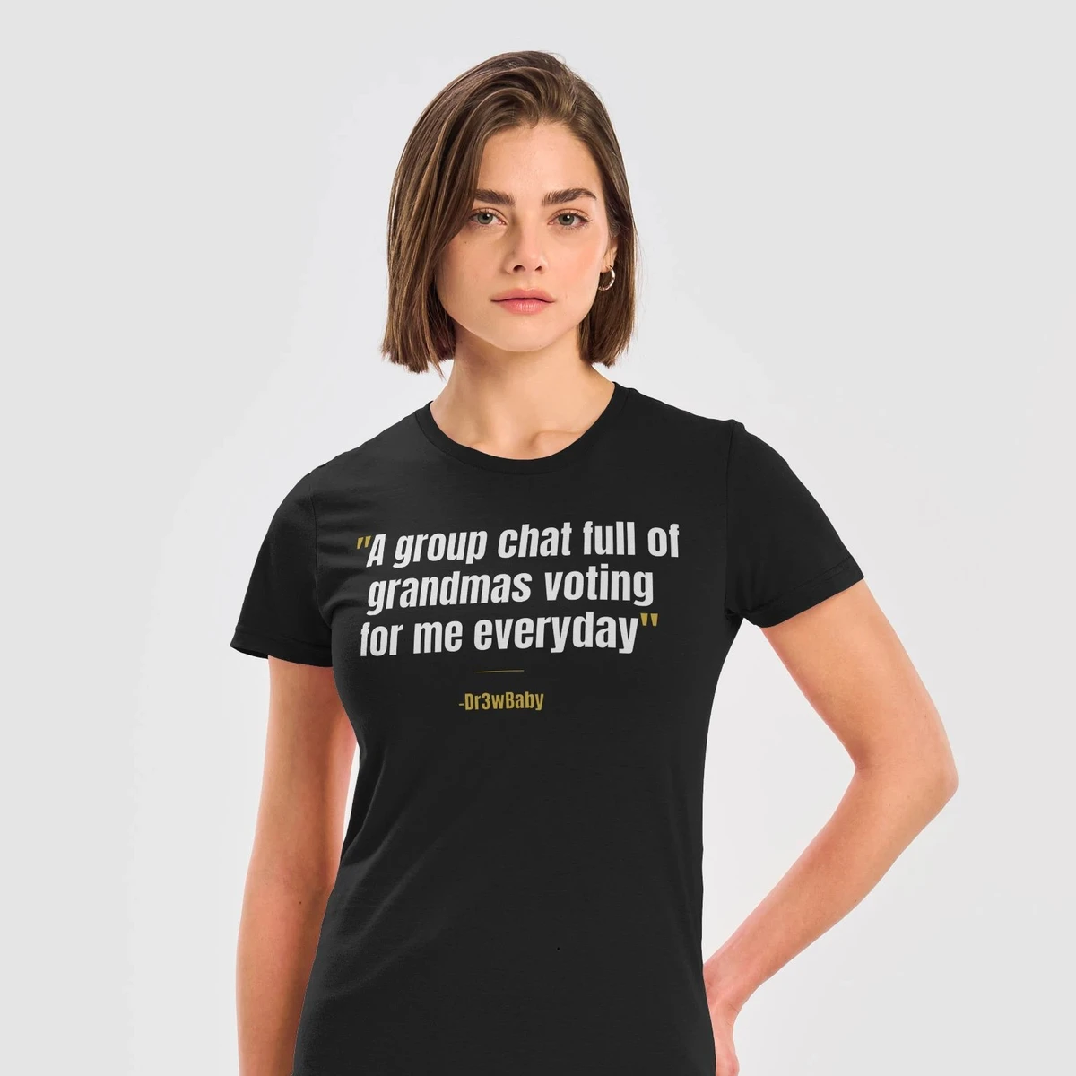 Grandma Army Tee: model wearing the black tee with the quote about a group chat full of grandmas voting every day