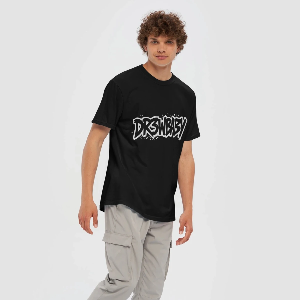 Dr3wBaby T-shirt: model wearing the black heavyweight tee with the white graffiti logo on the chest